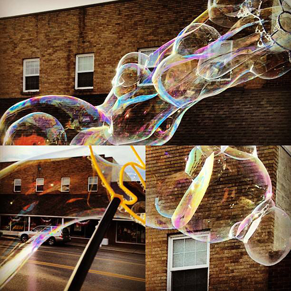 "bubbles in june" by Renne Emiko Brock - with huge bubbles downtown Sequim